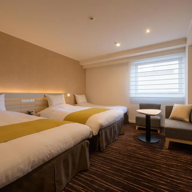 غرفة بسريرين منفصلين مع سرير إضافي، Hotel Jal City Sendai 2/5
