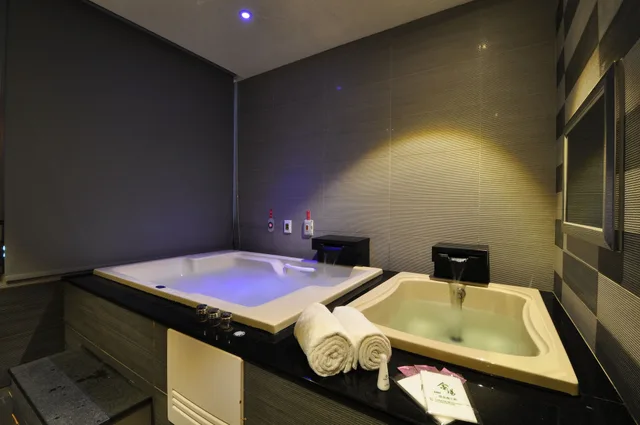 غرفة كلاسيكية ثلاثية بسرير كوين وسرير فردي، Jinspa Resort Hotel 7/8