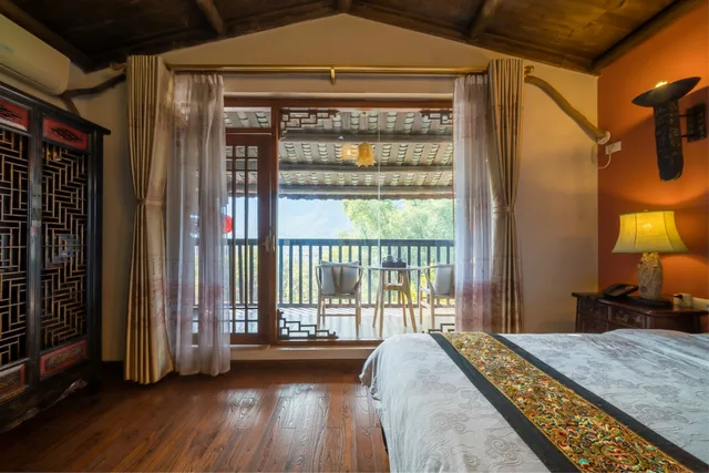 غرفة ديلوكس بسرير كوين، Yangshuo Tea Cozy Boutique Hotel 1/7