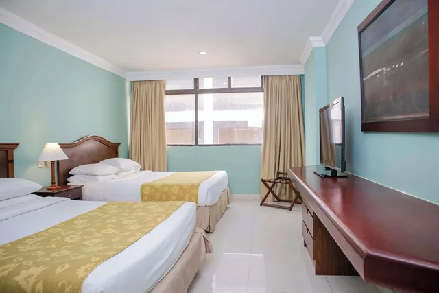غرفة بريميوم عائلية بسريرين مزدوجين، Hotel Faranda Express Puerta Del Sol Barranquilla, A Member of Radisson Individuals 2/3