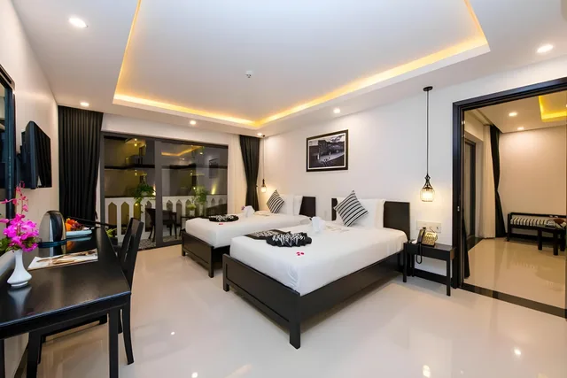 جناح متصل بسرير فردي، Gem Riverside Hotel Hoi An 1/1