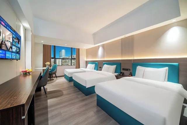 غرفة إليت ثلاثية بثلاثة أسرّة، Guangzhou Meigang Hotel 2/3
