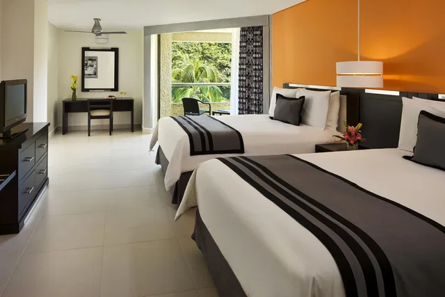 غرفة قياسية بسرير مزدوج بإطلالة على الحديقة، Dreams Huatulco Resort Spa All Inclusive 1/2