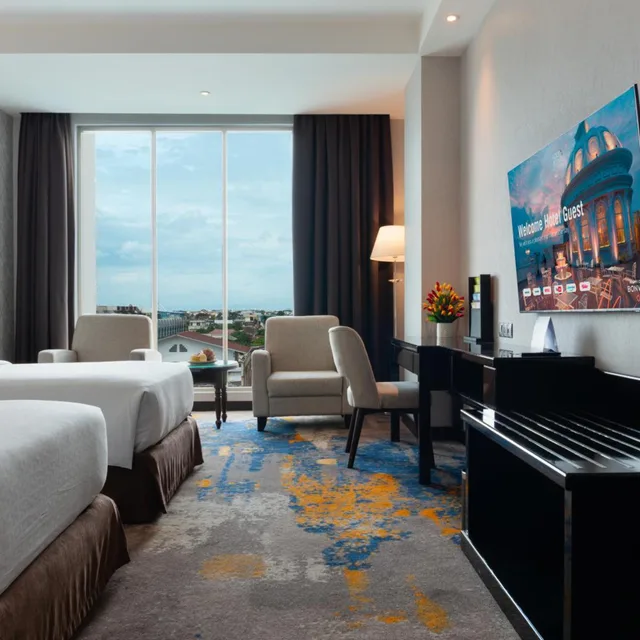 غرفة بزنس بسريرين منفصلين بإطلالة على المدينة، FOUR POINTS BY SHERATON MEDAN 4/6