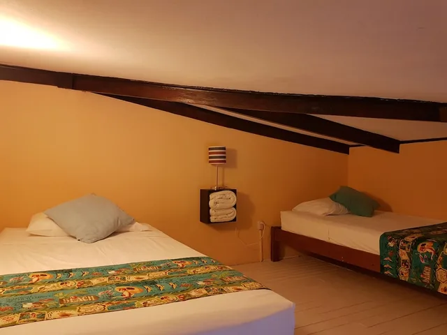 غرفة رباعية بسرير كينج وسريرين منفصلين بإطلالة على الحديقة، Hotel La Palapa 3/7