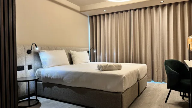 غرفة بسرير مزدوج أو سريرين منفصلين بإطلالة جزئية على البحر، Aste Hotel 2/2