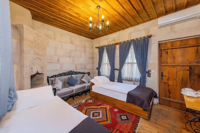 جناح ديلوكس بسريرين منفصلين وسرير كينج، Düven Hotel 1/10