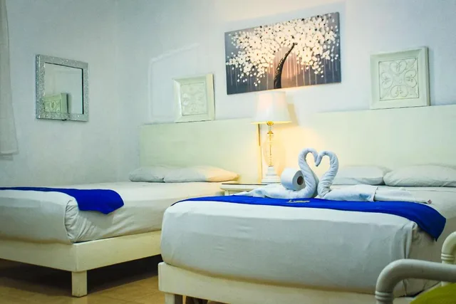 غرفة عائلية بسريرين مزدوجين بإطلالة على المسبح، Hotel Palacio Canton 9/10