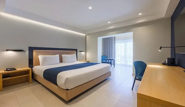 Junior Suite, Twin Beds, Garden View, Sofa, Maritim Antonine Hotel and Spa Malta 3/8