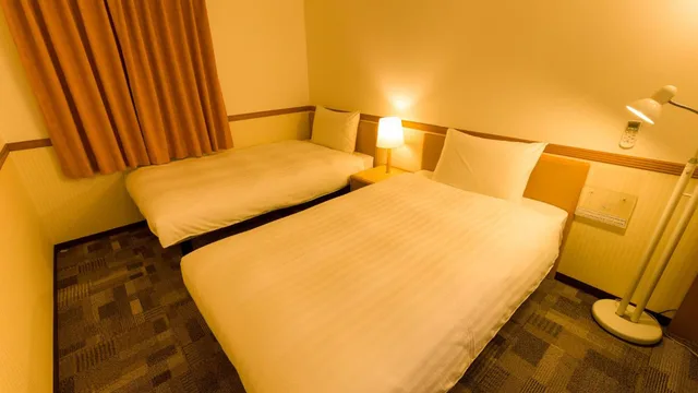 غرفة بسريرين منفصلين للمدخنين، Toyoko Inn Kagoshima Temmonkan No.2 3/5