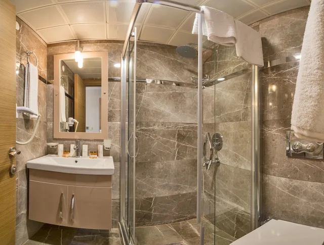 غرفة قياسية بغرفة نوم واحدة مفردة بسرير كوين، Grand Pamir Hotel 5/5