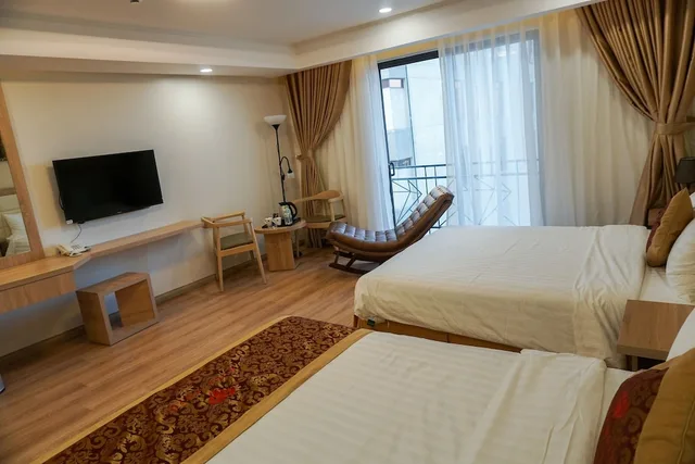جناح عائلي بسريرين مزدوجين بشرفة، Ruby Hotel 6/6
