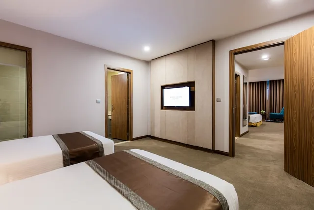 غرفة عائلية بسريرين منفصلين وسرير كينج، Muong Thanh Luxury Vien Trieu Hotel 4/6