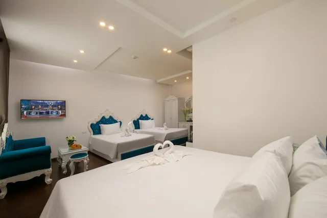 غرفة ديلوكس عائلية بسريرين منفصلين وسرير كينج بإطلالة على المسبح، Hoian Nostalgia Hotel & Spa 4/10