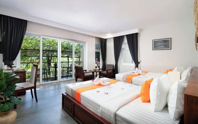 غرفة ديلوكس عائلية بسرير كوين بشرفة، Indra Angkor Residence 7/10