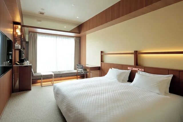 غرفة بسرير كينج مع دخول الصالة في طابق مرتفع، Candeo Hotel Utsunomiya 1/4
