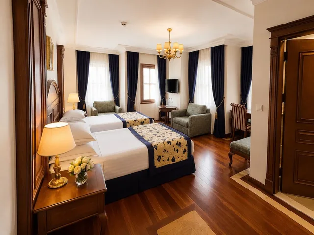 جناح متصل بسريرين كوين بغرفتي نوم مع أريكة، GLK Premier The Home Suites and Spa 3/10
