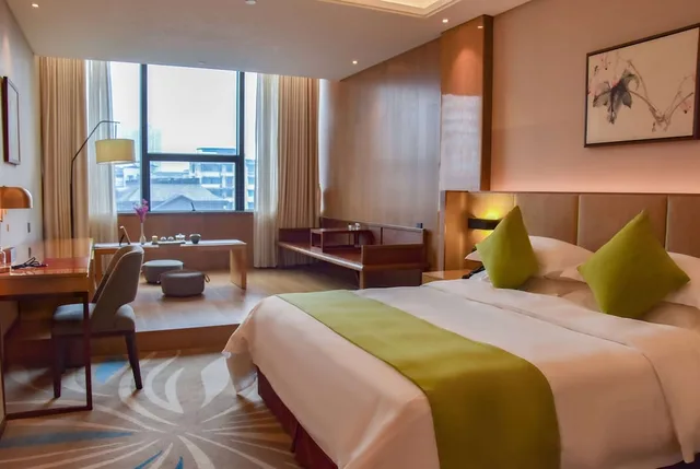 غرفة ديلوكس بسرير كينج للمدخنين، Ramada by Wyndham Leshan 2/10