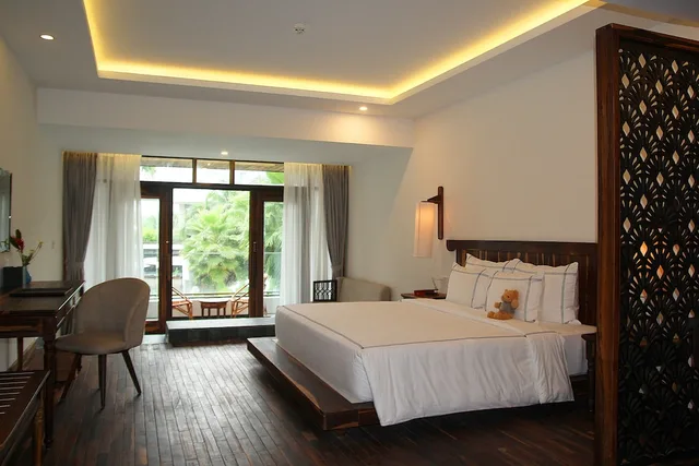 غرفة قياسية بسريرين منفصلين بإطلالة على الحديقة بشرفة، Alibu Resort 1/6