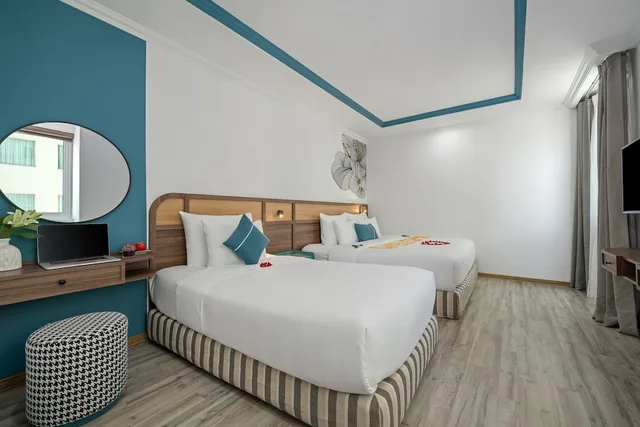غرفة ديلوكس بسرير كينج بإطلالة جزئية على البحر، PARACEL DANANG HOTEL 4/6