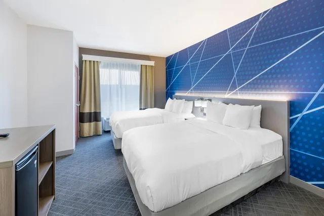 جناح بسريرين كوين مع أريكة لذوي الإعاقة، Comfort Suites Pecos 5/7