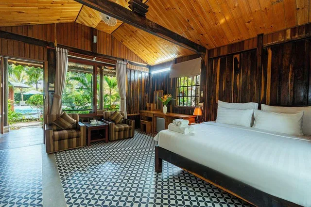 بنغل سيغنتشر بسرير كينج بإطلالة على المسبح بشرفة، Elwood Premier Resort Phu Quoc 1/1
