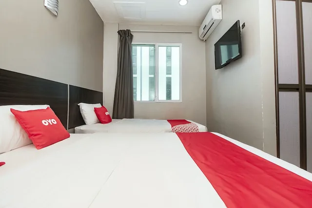 غرفة ديلوكس ثلاثية بسرير مزدوج وسرير فردي، OYO 89885 Nice Stay Three Six Five Services 1/7
