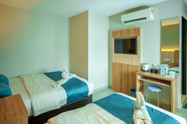 غرفة عائلية بسرير كينج وسرير فردي، Alaxis Hotel 1/9