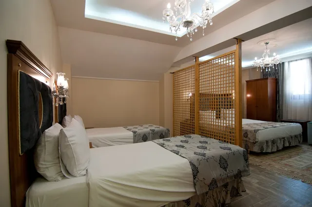 غرفة اقتصادية رباعية بسريرين منفصلين وسرير كينج مع أريكة في الطابق الأرضي، Ala Sofia Hotel 8/10