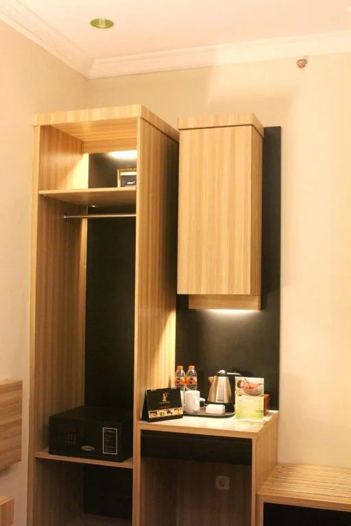 غرفة بزنس بسرير كوين، Top Malioboro Hotel 7/7