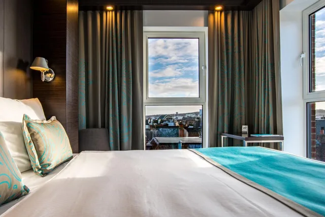 غرفة قياسية بسرير كينج بإطلالة على المدينة، Motel One 4/6