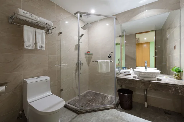 غرفة بسريرين منفصلين بإطلالة على الحديقة، Nan Yang Royal Hotel 4/4
