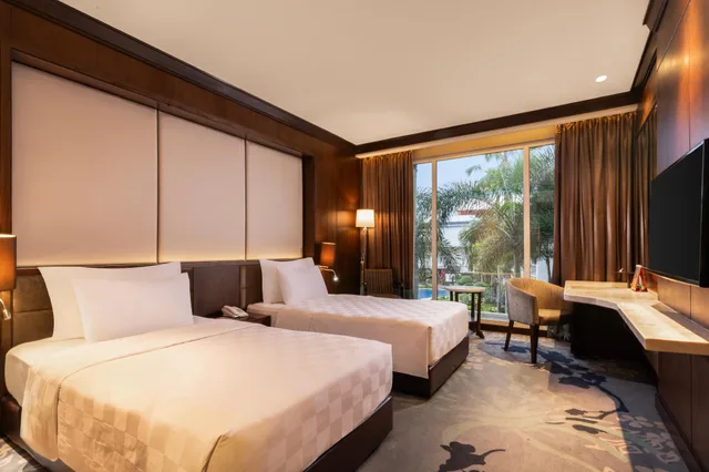 غرفة ديلوكس بسريرين منفصلين بإطلالة على المسبح، SWISS-BELHOTEL BORNEO BANJARMASIN 1/1