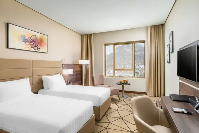 غرفة بسريرين منفصلين، ورجا هوتيل أل نور(Wirgan Al Noor, Tapestry Collection by Hilton) 2/2