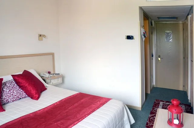 غرفة مفردة بسرير كوين، HOTEL BASSETTO 1/3
