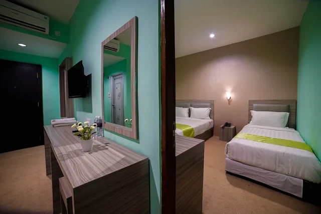 غرفة غراند ديلوكس بثلاثة أسرّة، GREENLAND HOTEL BATAM 1/5