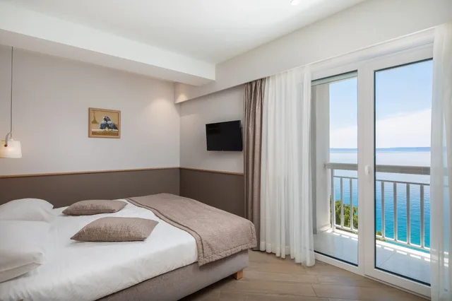 شقة سوبيريور بسرير كينج وسريرين منفصلين بإطلالة على البحر بشرفة بغرفتي نوم مع أريكة، APARTHOTEL TAMARIS 1/6