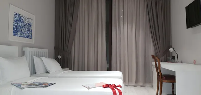 غرفة قياسية ثلاثية بسرير فردي، Metro Hotel Tirana 1/2