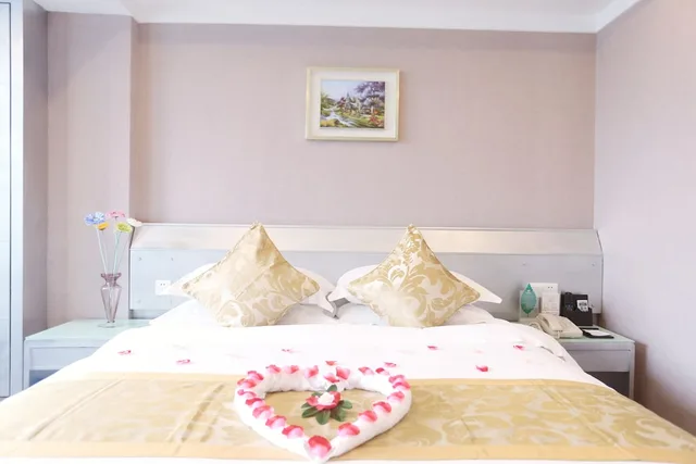 غرفة ديلوكس بسرير كينج، Yihe Business Hotel Guangzhou 5/7