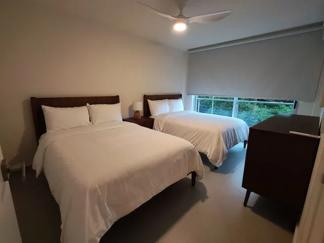 4 Bedrooms, Condo, Deluxe, King Bed, 1 Queen and 2 Double Beds, Partial Ocean View, Garden Area، Villa Marina Lodge and Condos 2/5