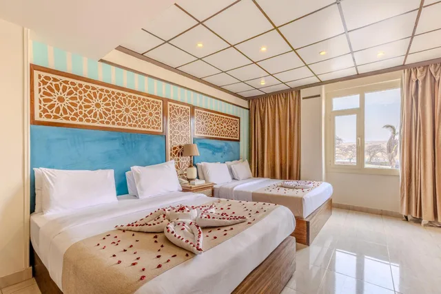 غرفة رباعية بسريرين كوين بشرفة، Great Pyramid Inn 2/4