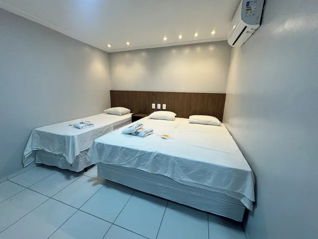 غرفة ثلاثية بسرير كوين وسرير فردي بإطلالة على البحر، Hotel Luar De Itapua 5/10