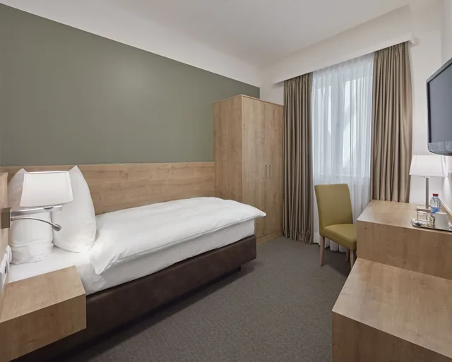 غرفة كومفورت ثلاثية بثلاثة أسرّة بغرفتي نوم، City Hotel Luxembourg 1/3