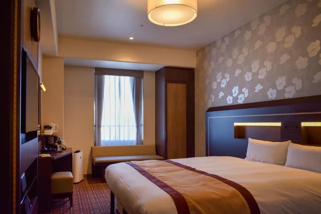 غرفة مفردة بسرير كينج في طابق مرتفع، Hotel Monterey Fukuoka 1/2