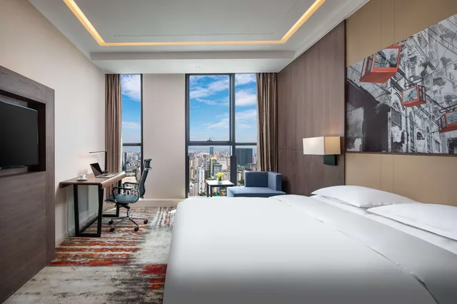 غرفة بسرير كينج للمدخنين، Ramada Encore by Wyndham Chongqing Yubei 1/1