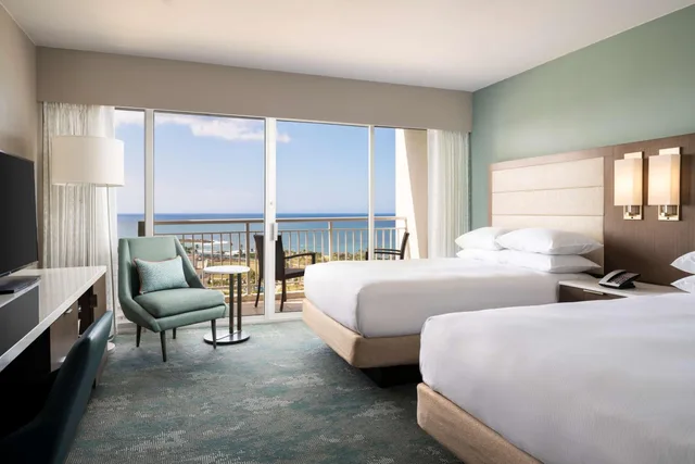 جناح جونيور عائلي بسرير كينج وسرير كينج وسريرين مزدوجين مع أريكة، Caribe Hilton 3/5