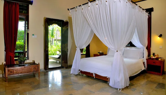 غرفة ديلوكس بسرير كوين وسرير فردي، CORAL VIEW VILLAS 1/1