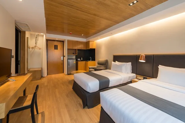 غرفة ديلوكس بسريرين منفصلين، Asana Hotel & Residence 1/4