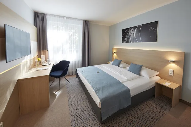 غرفة بزنس بسرير مزدوج، Four Points Flex by Sheraton Goettingen 1/4
