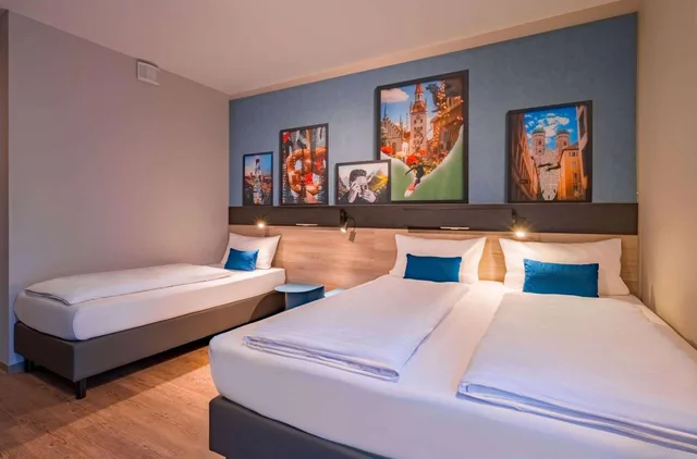 غرفة ديلوكس ثلاثية بسرير فردي وثلاثة أسرّة، Ramada Encore by Wyndham Munich Messe 4/10